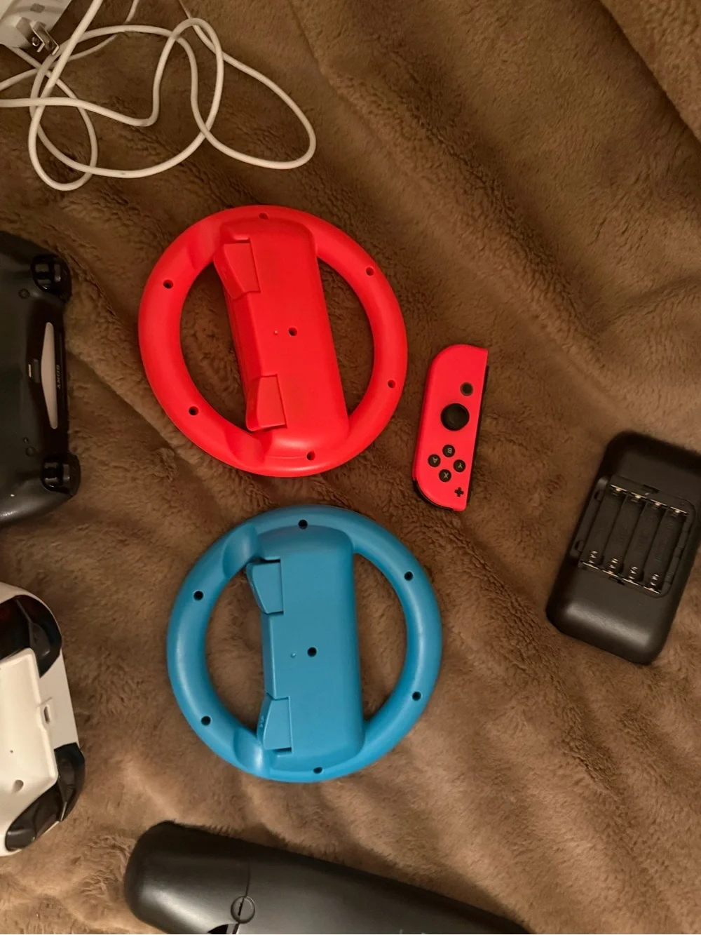 Assorted Video Game Controllers and Accessories - Blue, Red, White, Black